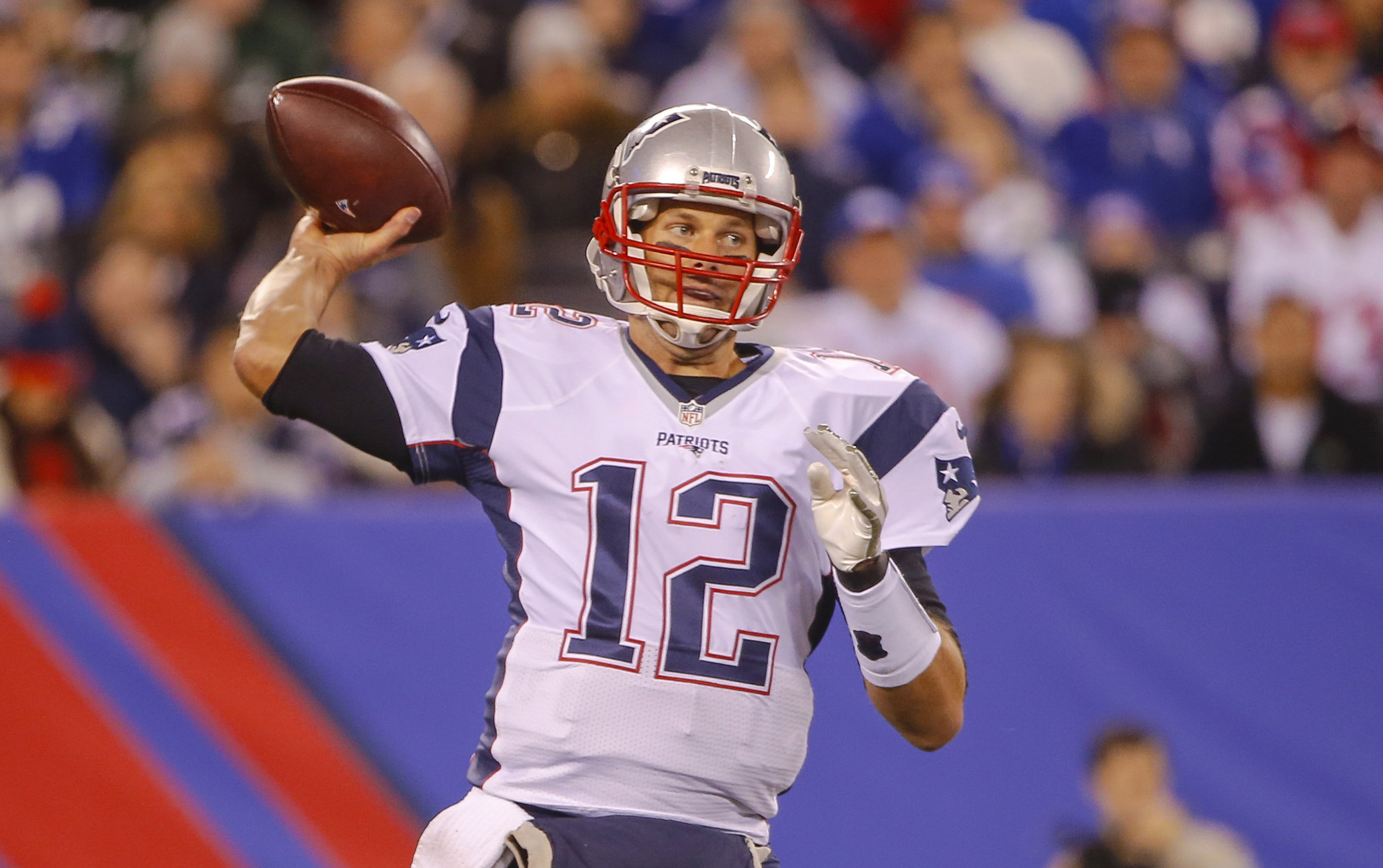 New England Patriots quarterback Tom Brady (12) throws a pass in the second  quarter against the