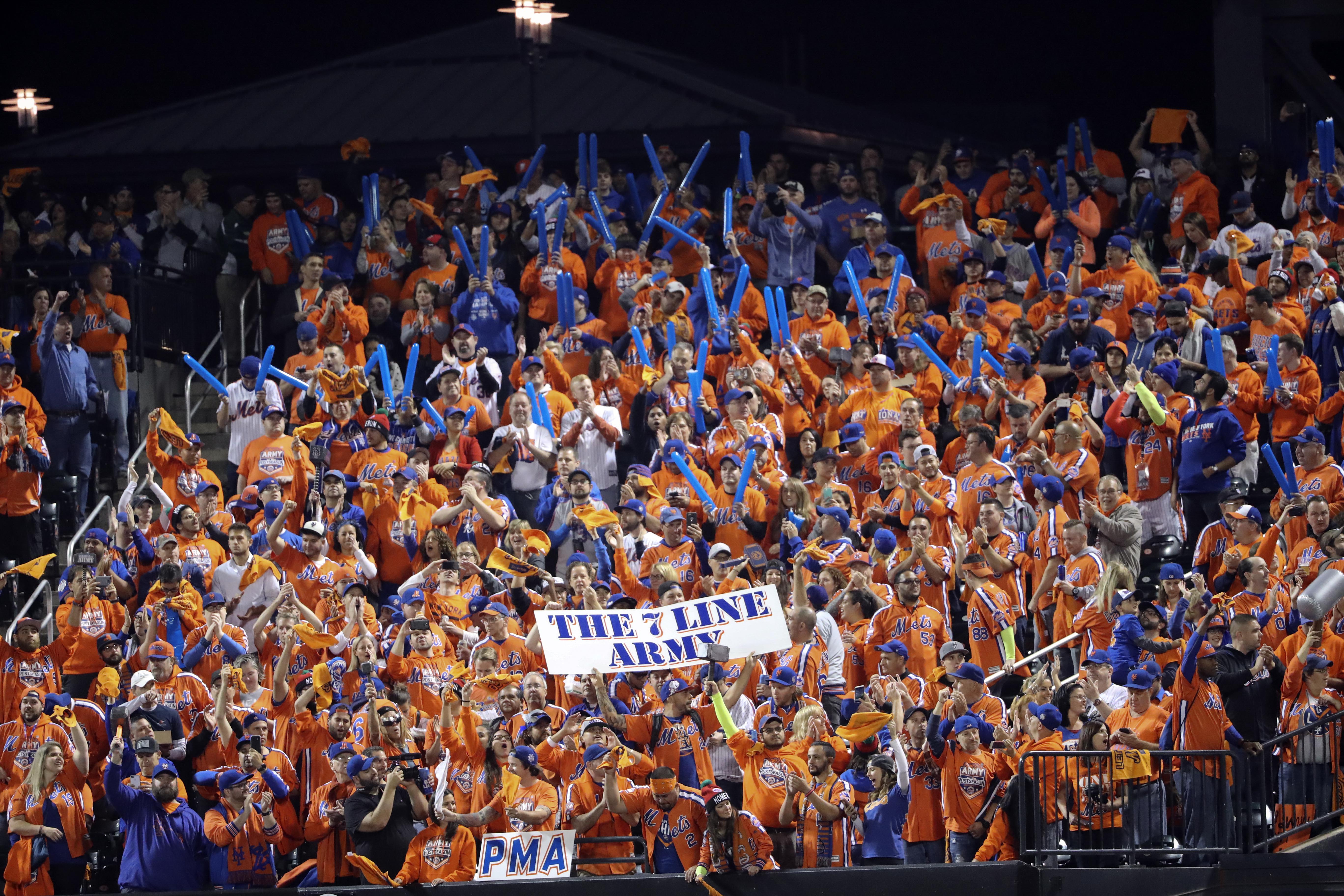 New York Mets fans cheer before Game 2 of a National League wild